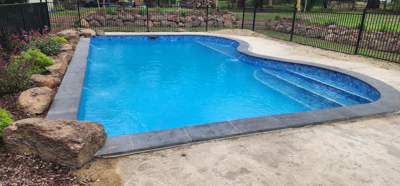 Curved pool coping Melbourne installation