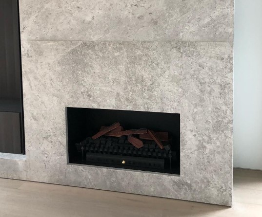Tundra Grey Limestone Fireplace